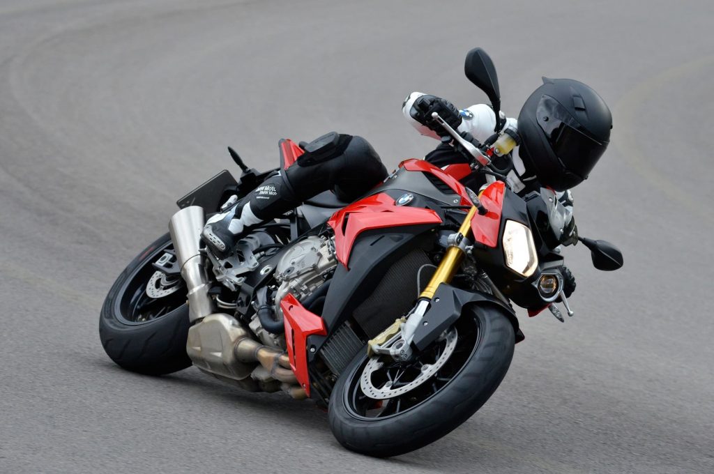 2014-2016 BMW S 1000 R red riding leaned over left