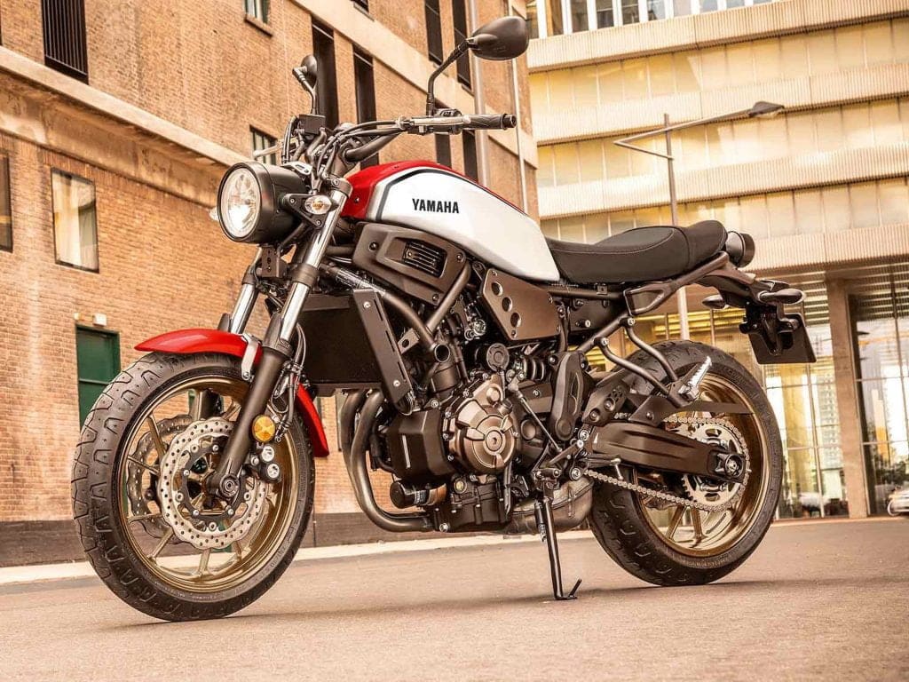 Yamaha XSR700 in industrial area, vintage style photo