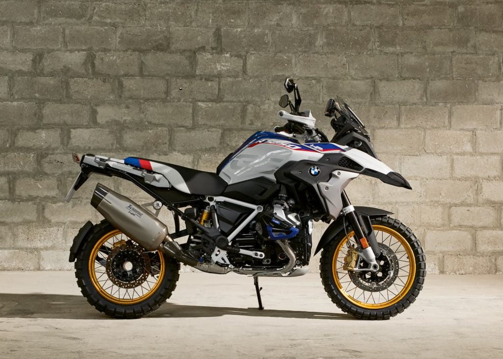 BMW R 1250 GS HP white and blue against brick wall
