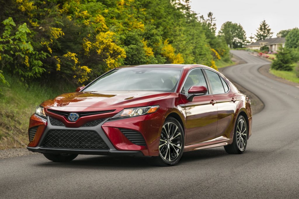 2018 Toyota Camry Hybrid SE red driving
