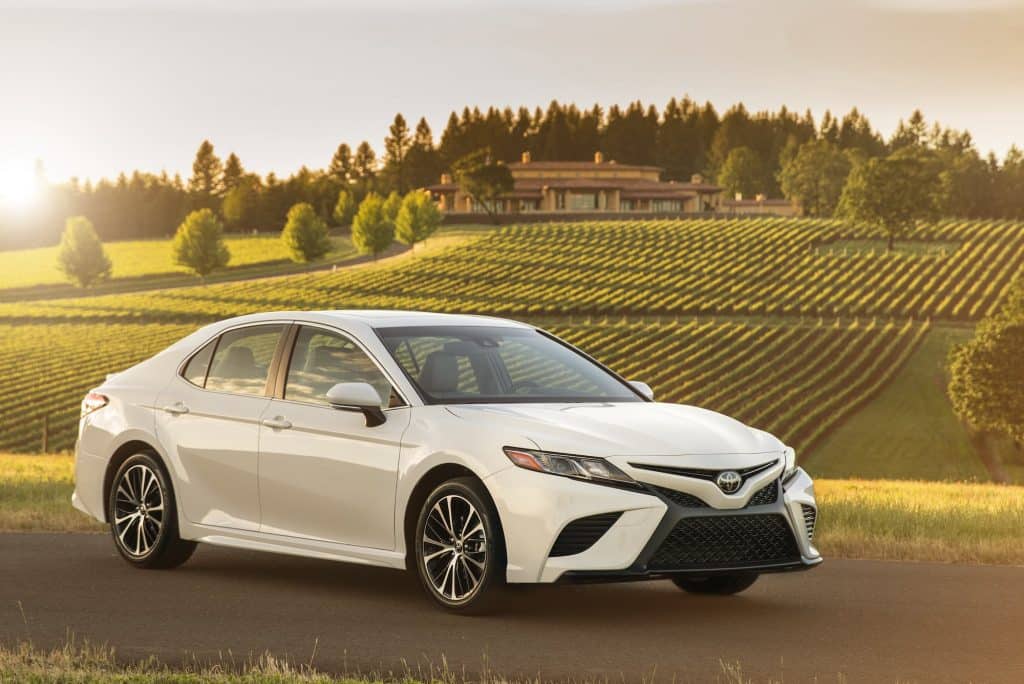 Toyota Camry SE inline 4 white parked rice fields