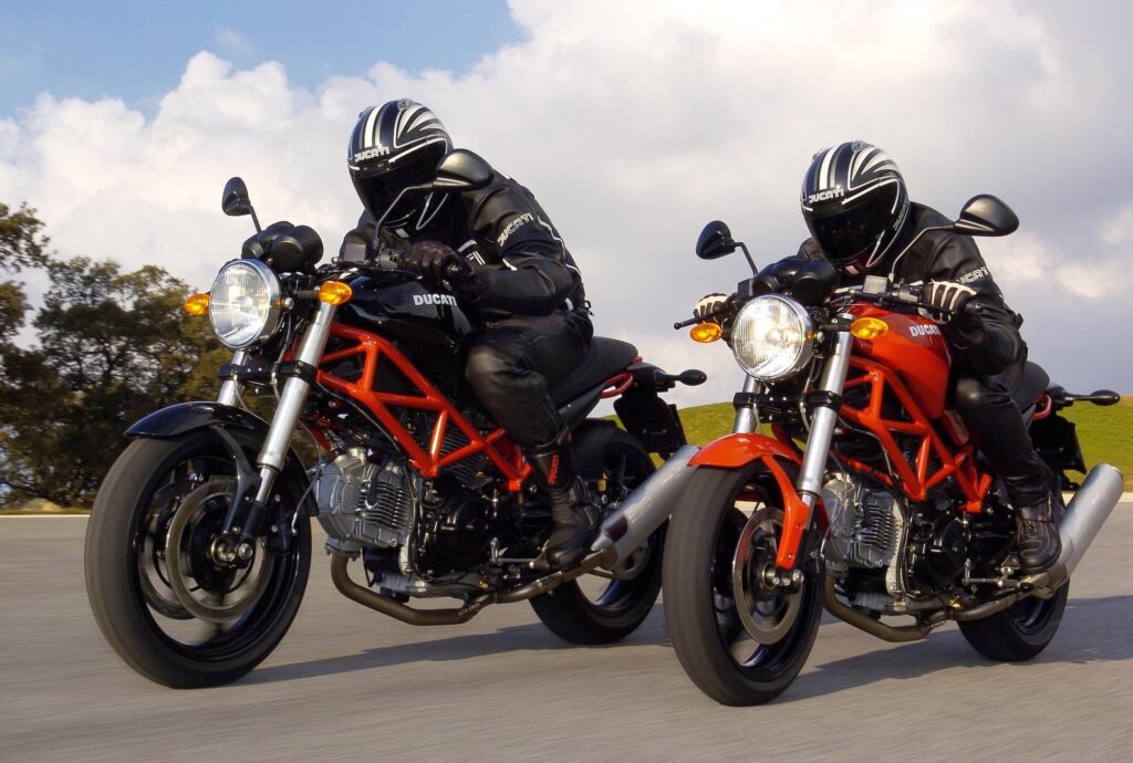 Ducati Monster 695 black and red side by side
