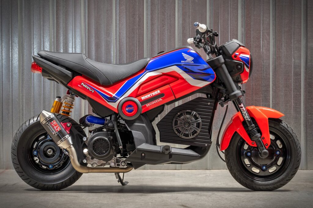 Red blue and white Honda Navi with higher spec components