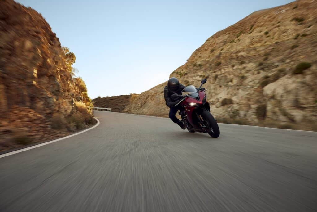 Triumph Daytona 660 Action leaning in canyon